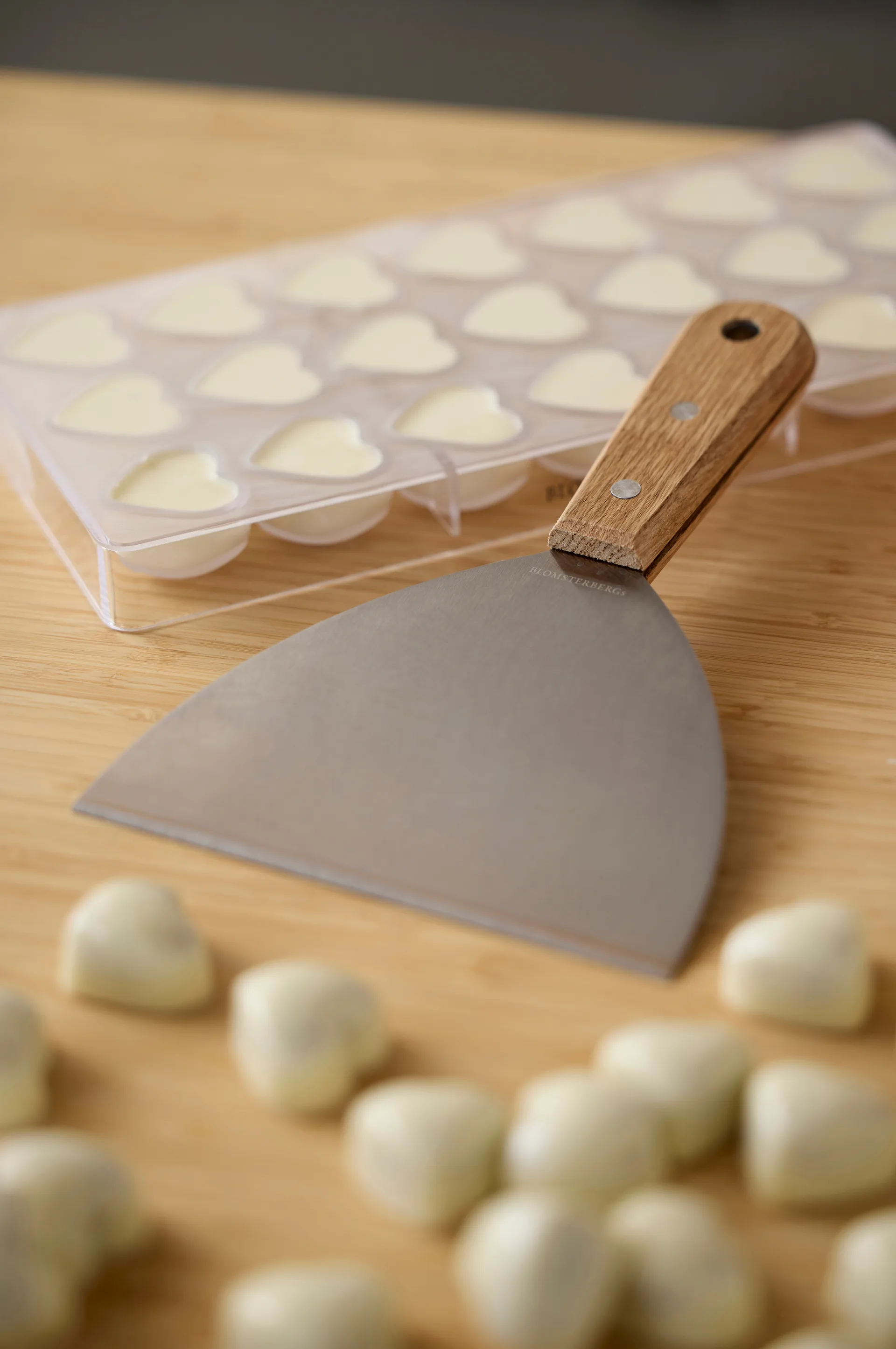 Blomsterbergs sjokoladeskrape, Eik-rustfritt stål Blomsterbergs