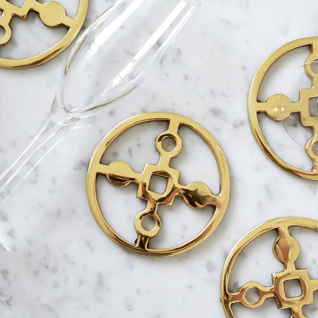 Anima Gemella glassunderlag 4-pakning , Solid messing Hilke Collection