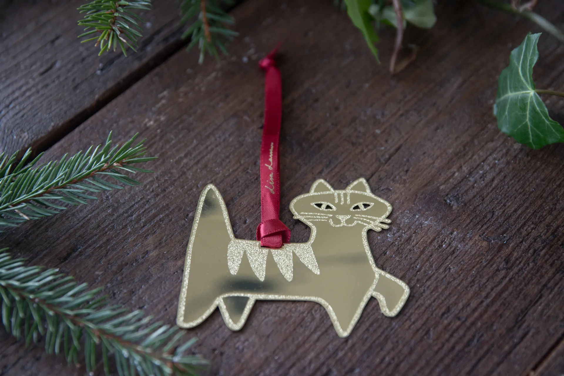 Lisa Larson Felix dekorasjonsanheng, Gull Pluto Design